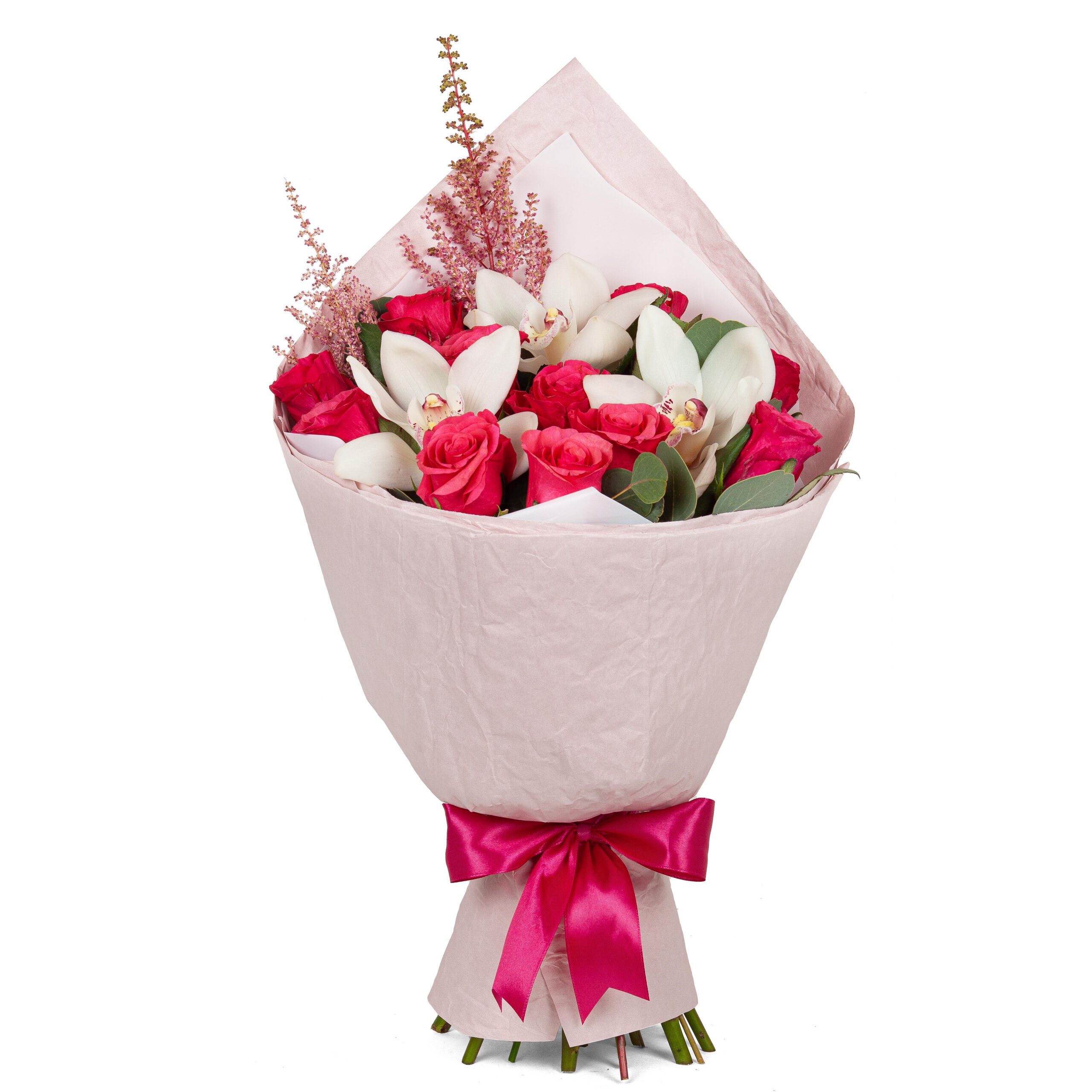 Bouquet of red an white flowers wrapped in pink paper cone with ribbon for present isolated on white background
